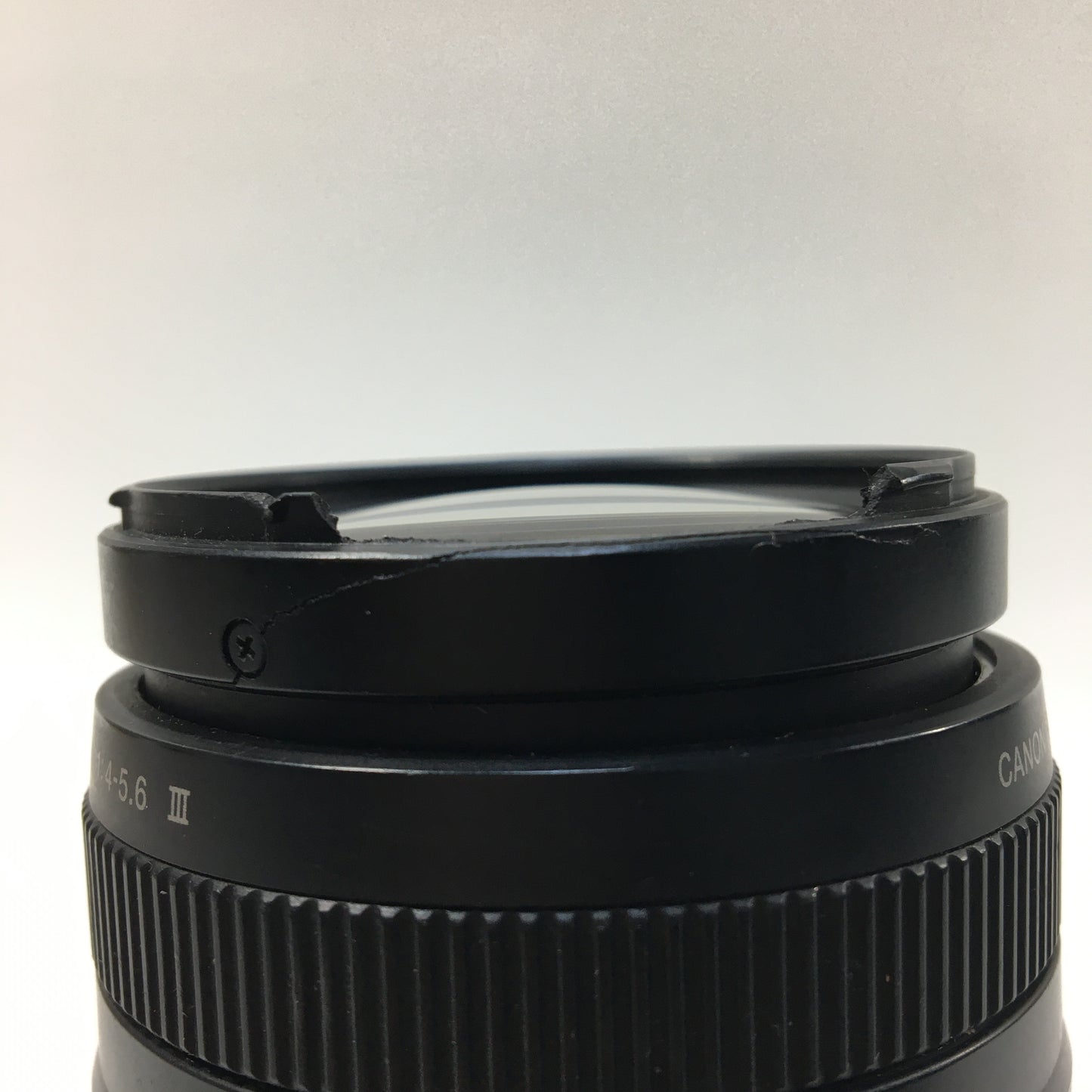 Canon EF EF 75-300mm 75-300mm f/1.4-5.6 III Cracked Near Lens